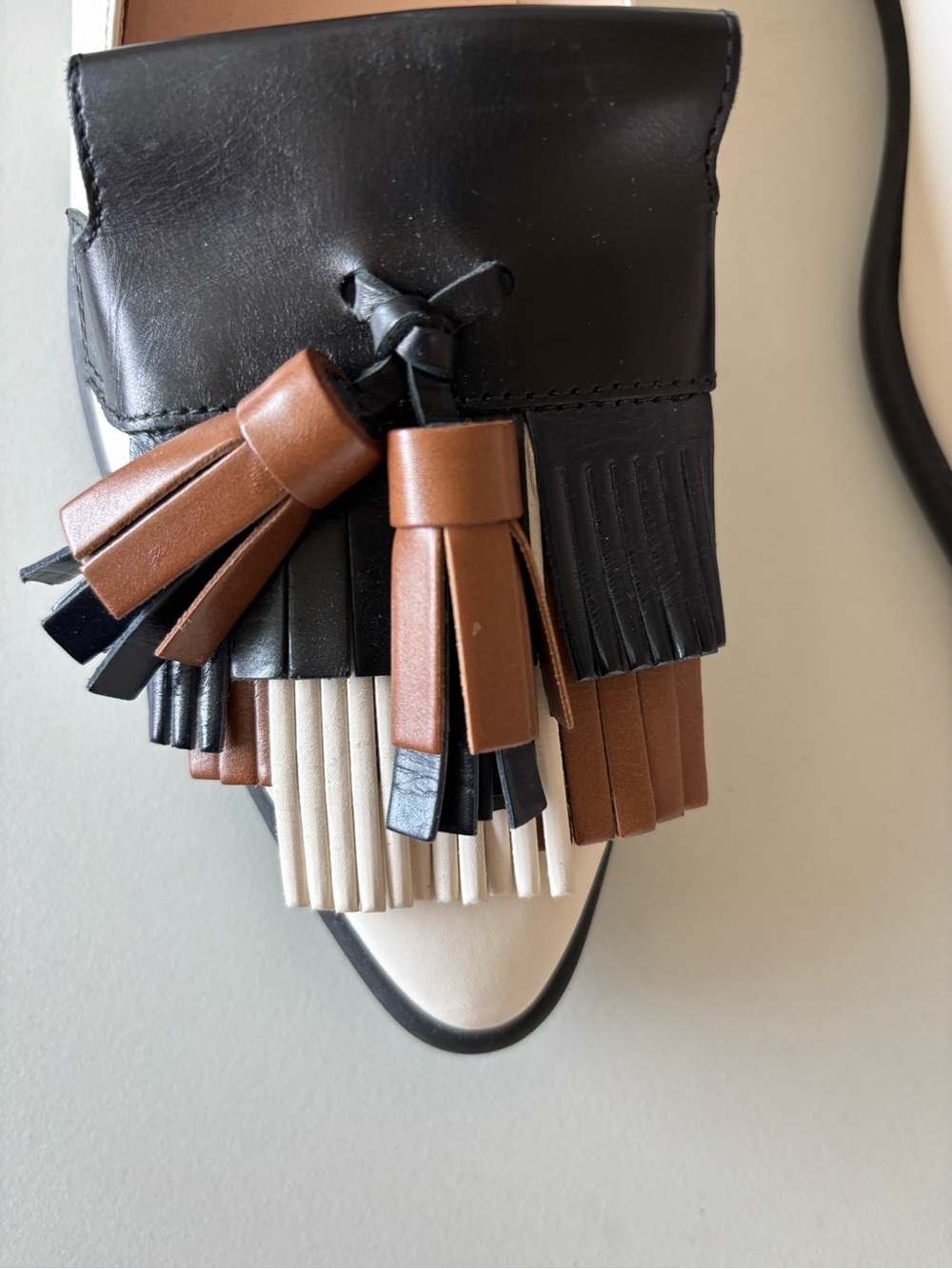 TOD'S Two-Tone Cream, Black & Brown Tassel Loafers - Picture 5 of 6